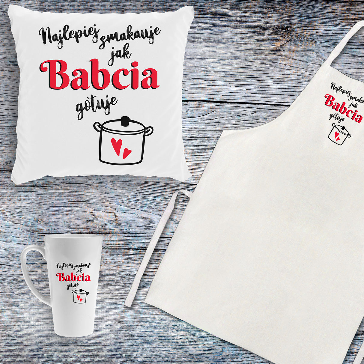 Zestaw Fartuch,Kubek,Poduszka Najlepiej smakuje jak Babcia Gotuje Prezent na Dzień Babci