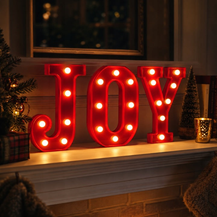 Świecący napis JOY LED z ciepłym białym światłem