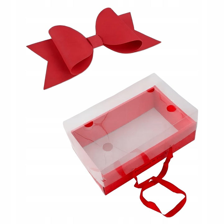 Czerwone pudełko prezentowe z dużą kokardą